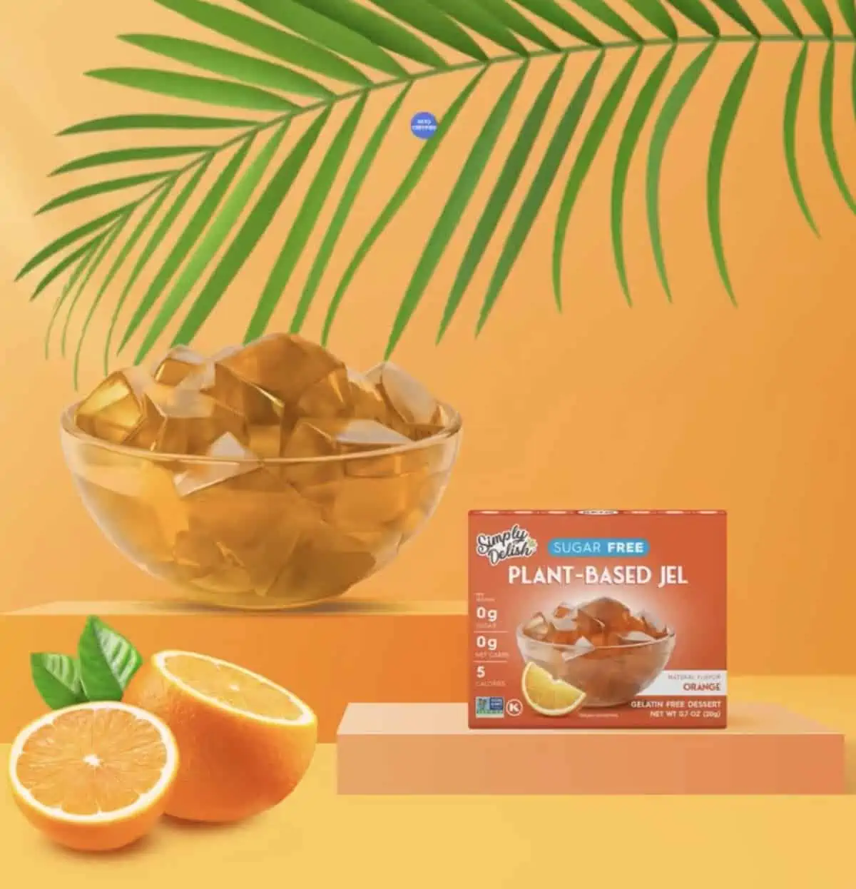 Box of Simply Delish brand plant based vegan  jello mix in tropical setting.