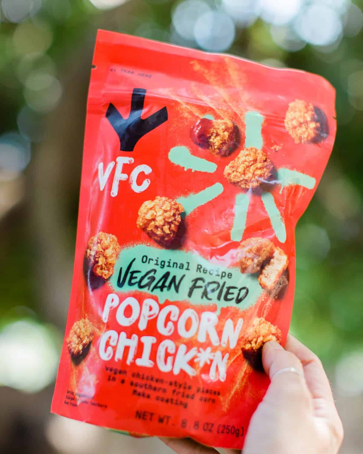 A red bag of frozen vegan popcorn chicken nuggets from the brand VFC. 