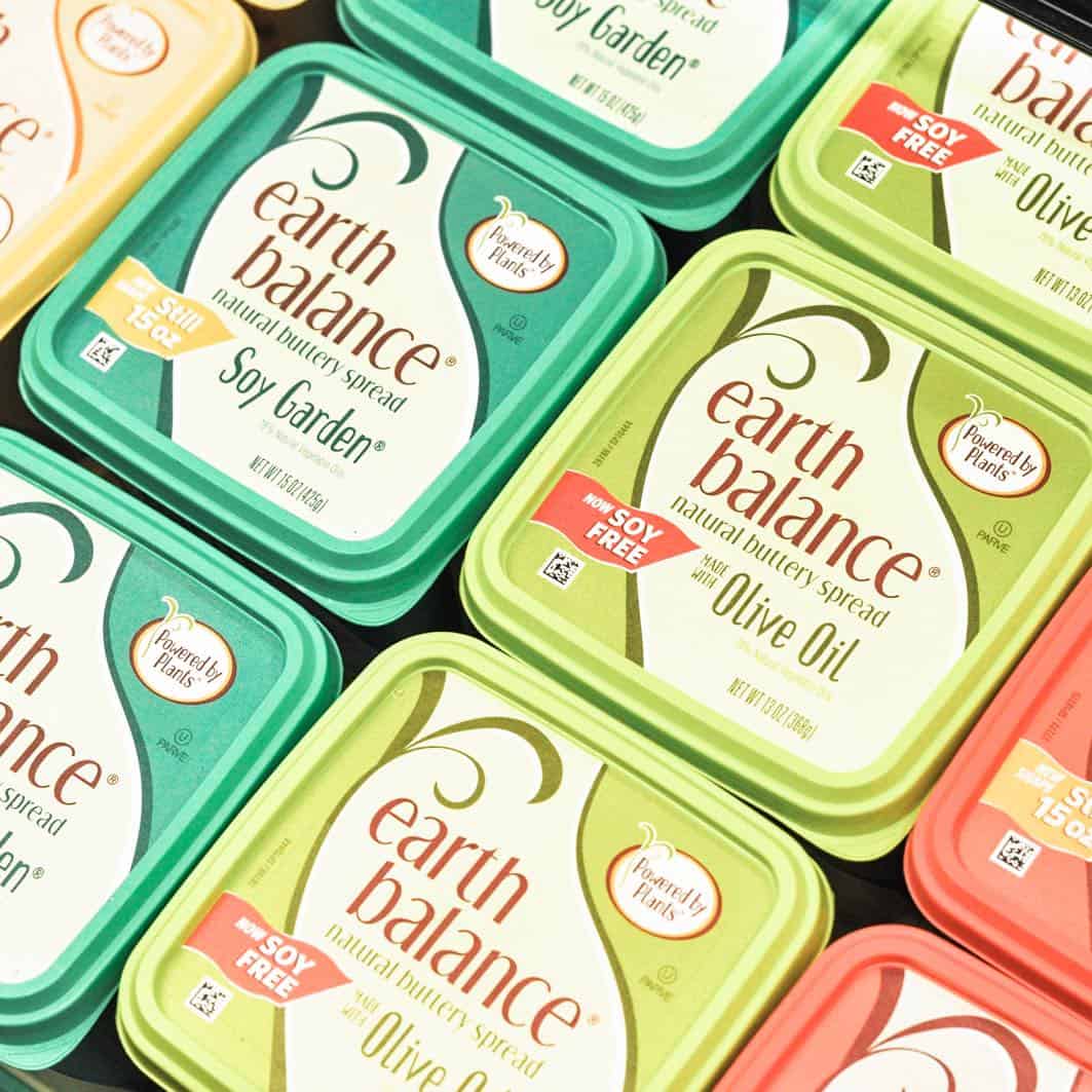 colorful tubs of different types of earth balance dairy free butters