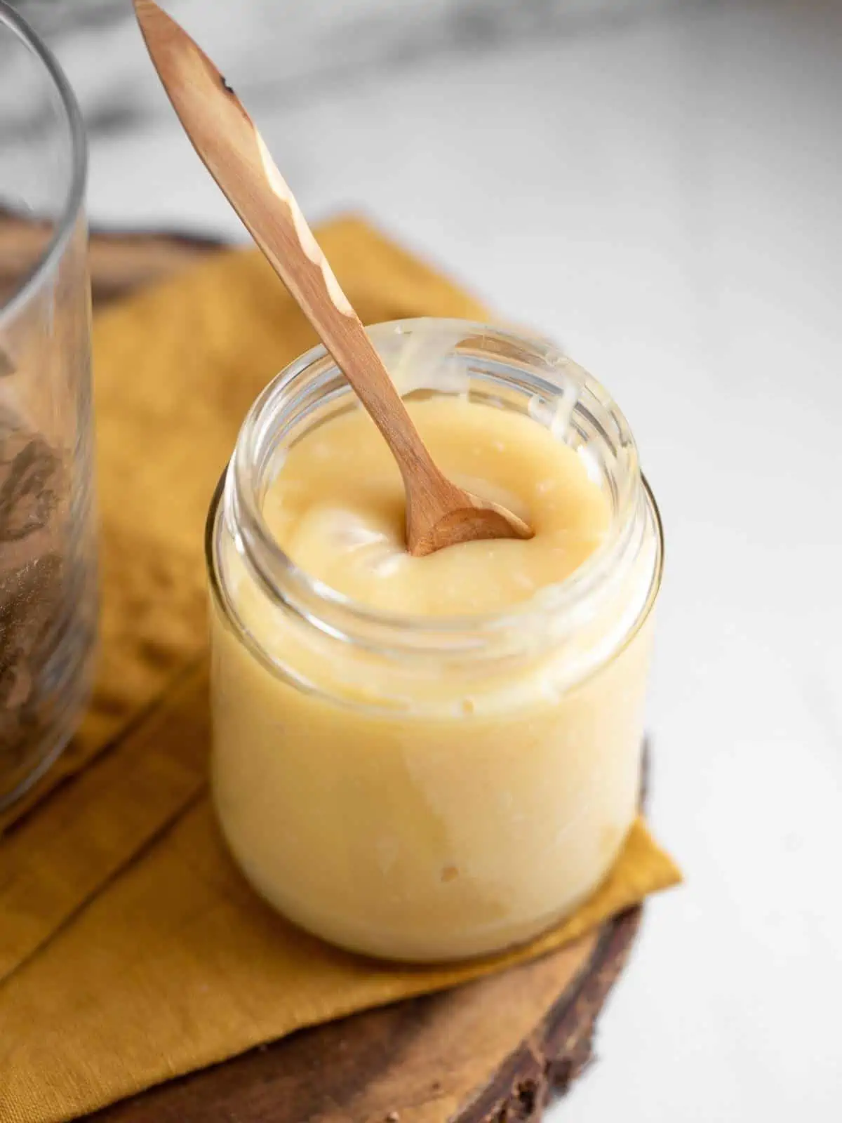 glass jar of sweetened condensed coconut milk