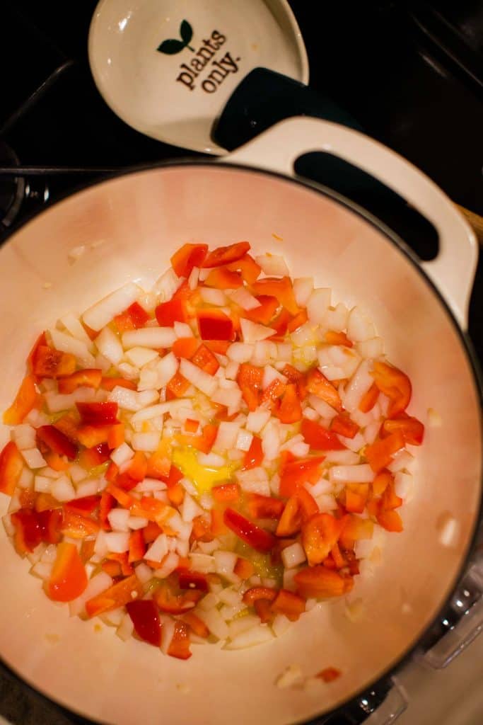 sauteeing onion garlic and bell pepper in large pot