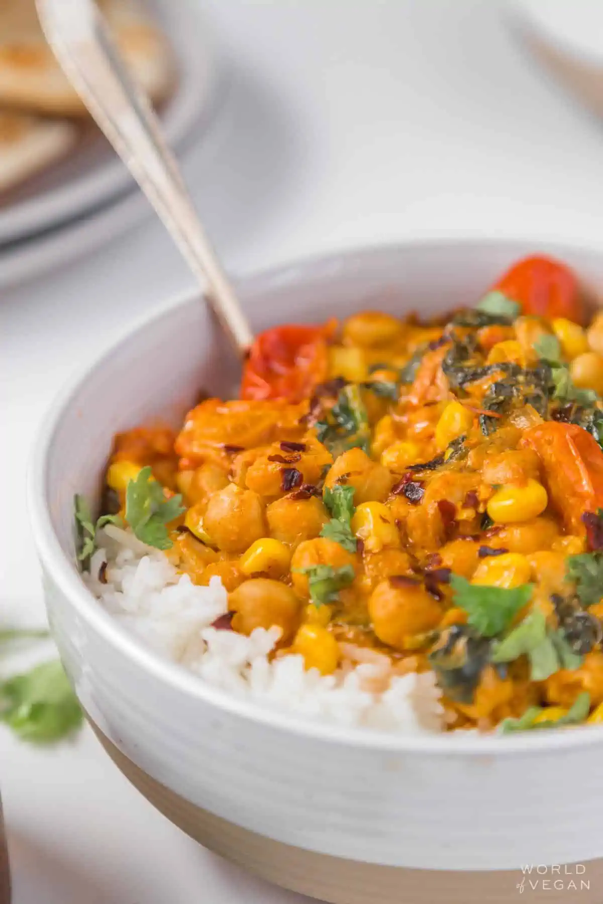 vegetarian chickpea spinach corn curry bowl