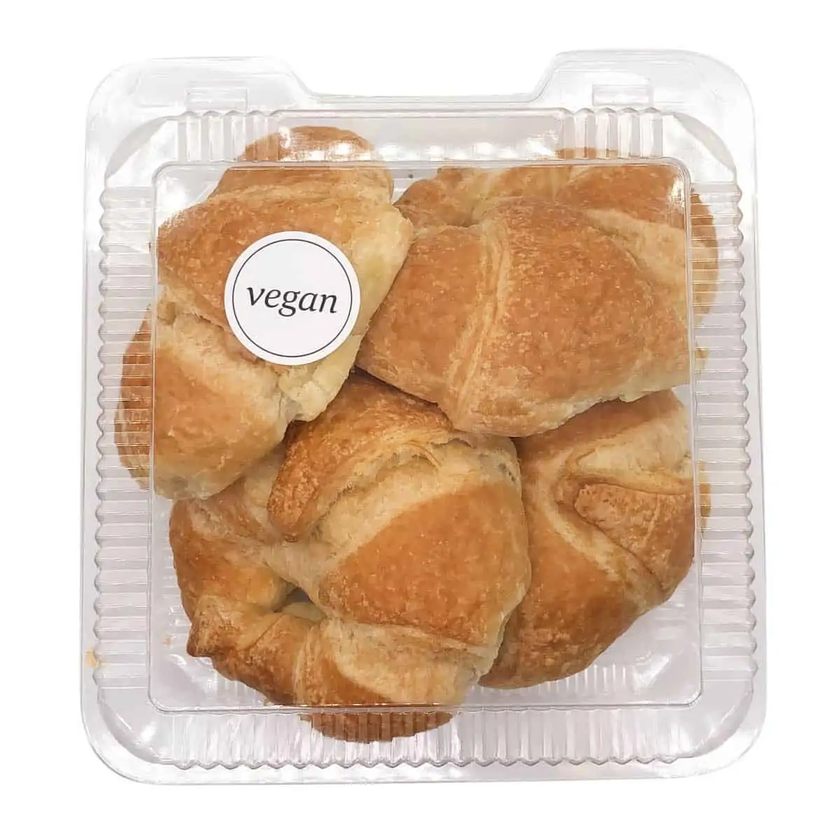 a plastic container filled with dairy-free vegan croissants from whole foods market