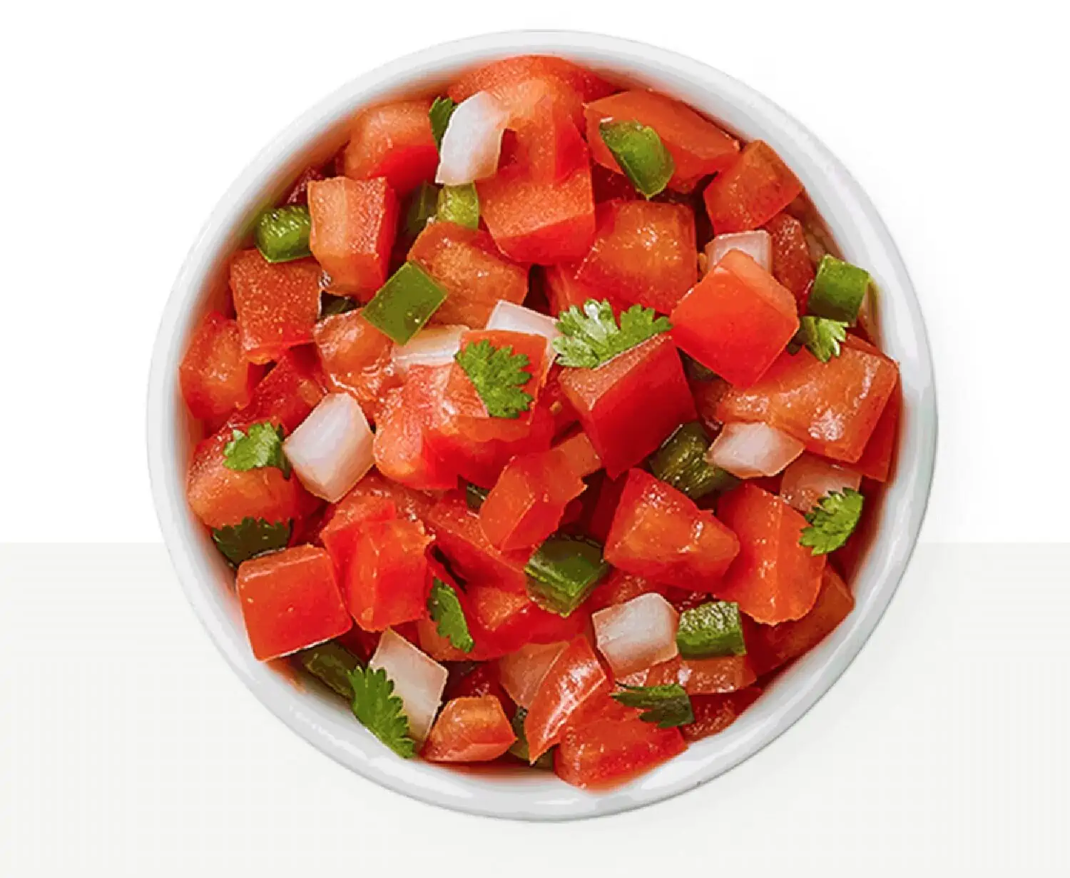 A small white bowl filled with diced tomatoes, jalapenos, white onion, and cilantro on a white and off white background.