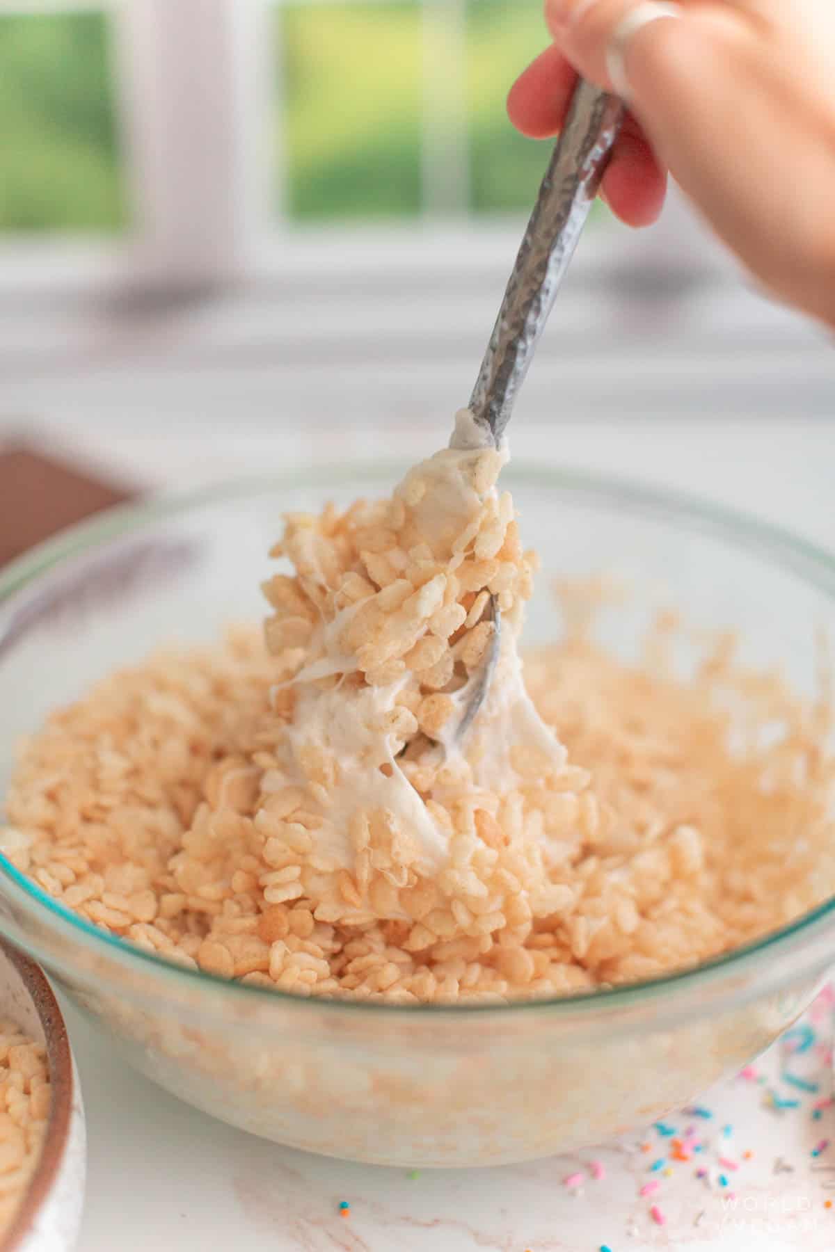 mix rice krispies cereal with melted marshmallows