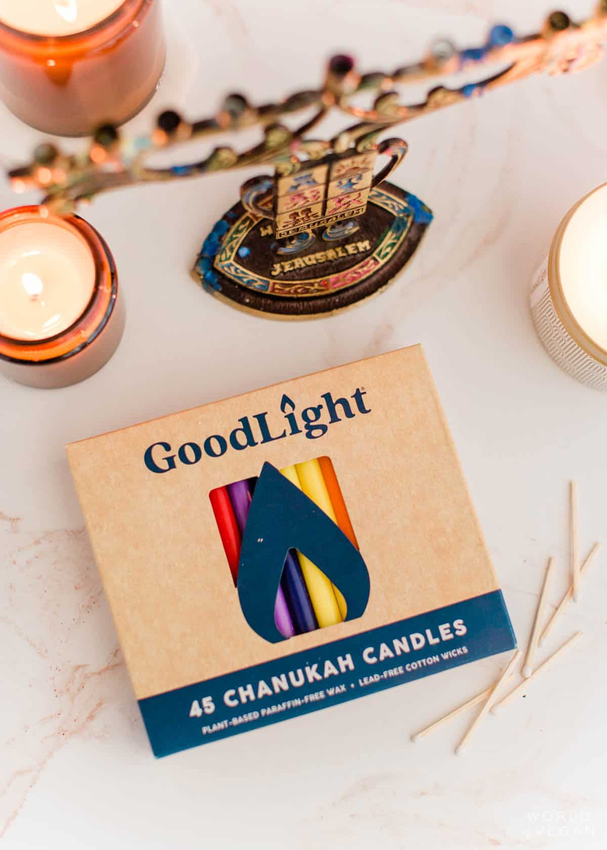 vegan hanukkah candles in box with menorah