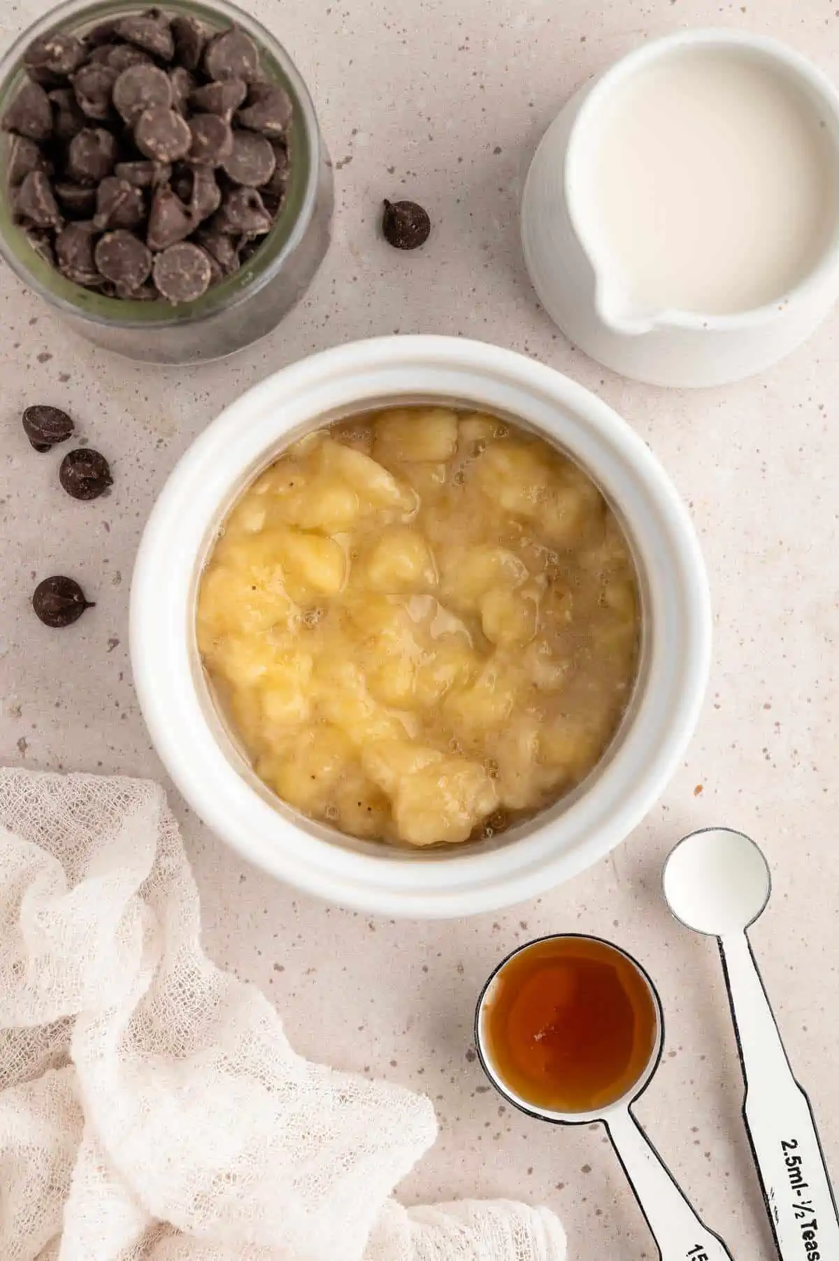 Mashed banana in a ramekin.