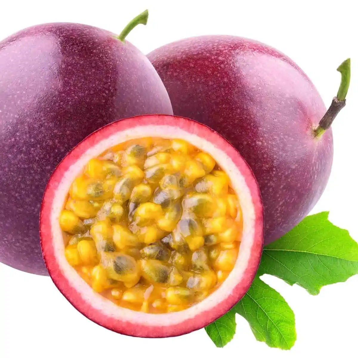 a perfect pink passionfruit bursting with yellow lilikoi seeds