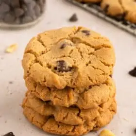 Vegan peanut butter chocolate chip cookies in a stack.