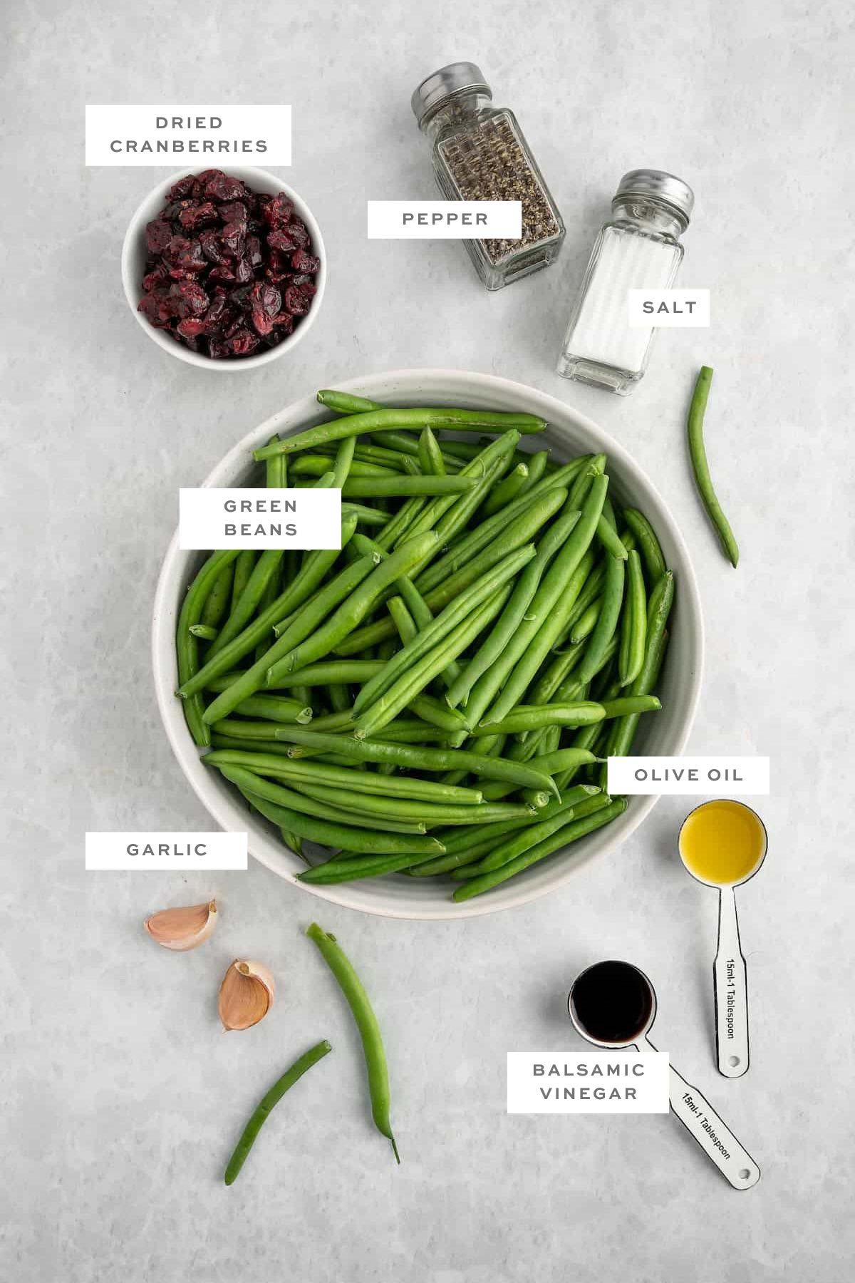 Ingredients for garlic green beans with labels.