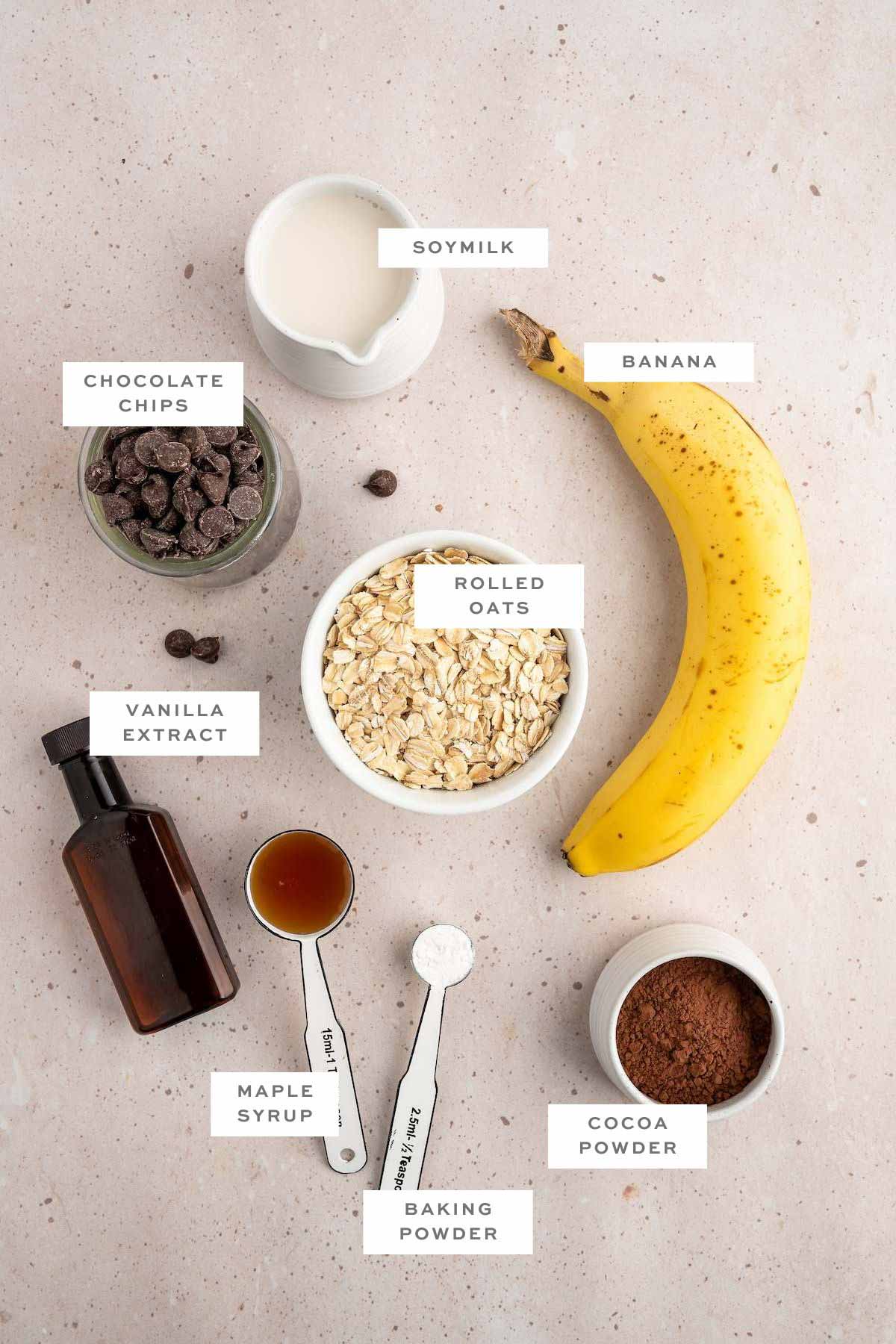 Ingredients for a protein mug cake with labels. 