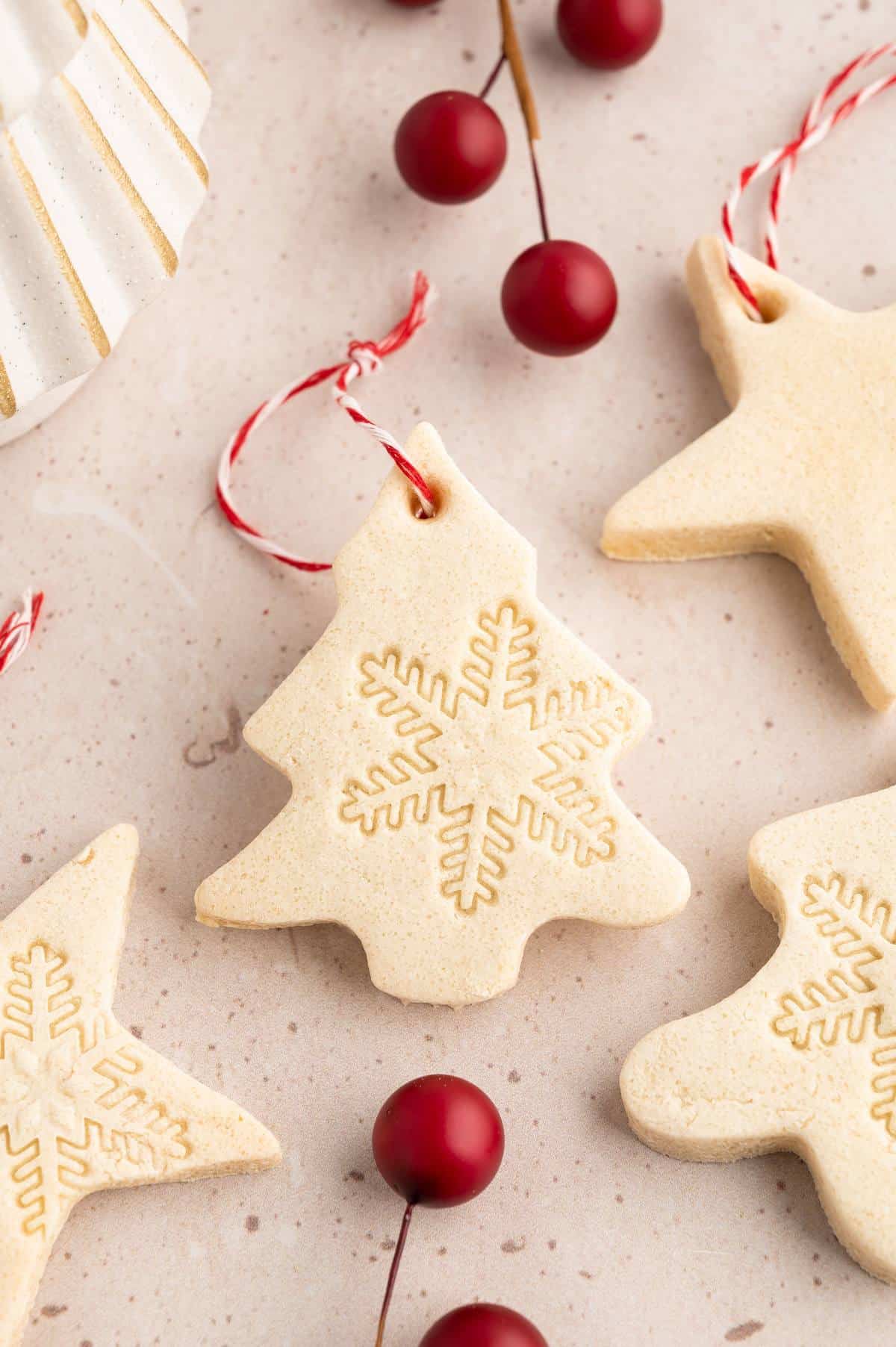 Salt dough ornament shaped like a Christmas tree.