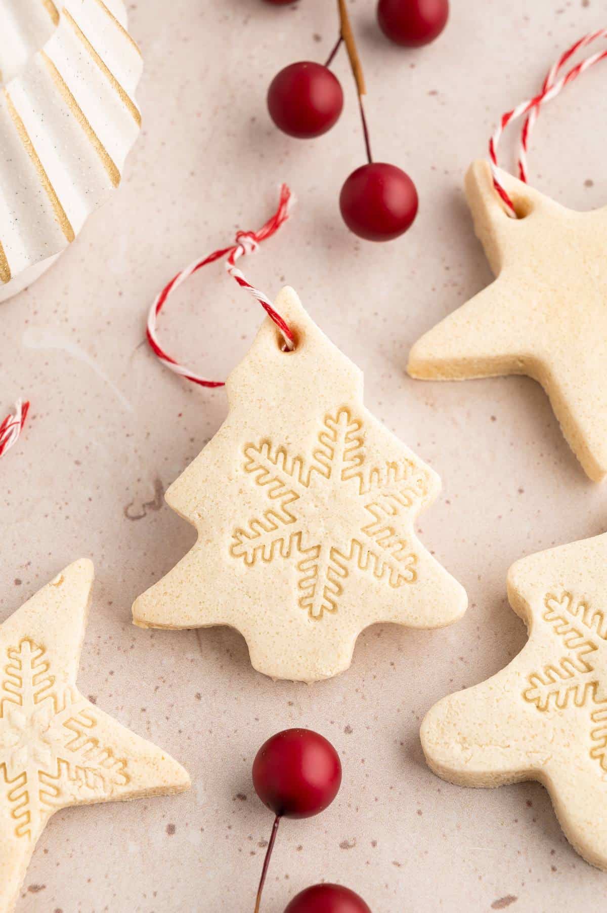 Salt dough ornament shaped like a Christmas tree.