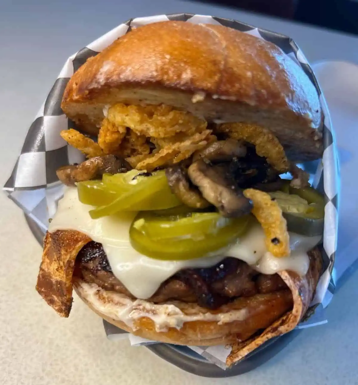 A spicy vegan jalapeno burger from Vegan Junk Food restaurant.