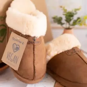 Fuzzy leather-free faux-fur lined vegan slippers from the brand Bearpaw.