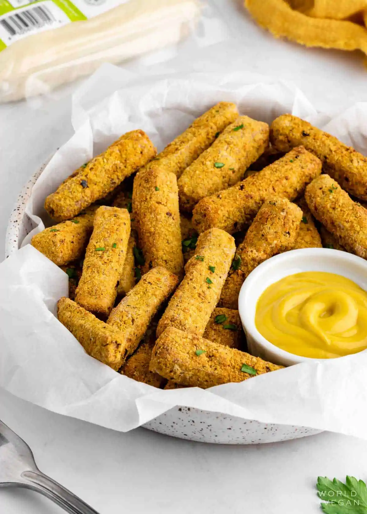 Bowl of crusted tofu fries. 