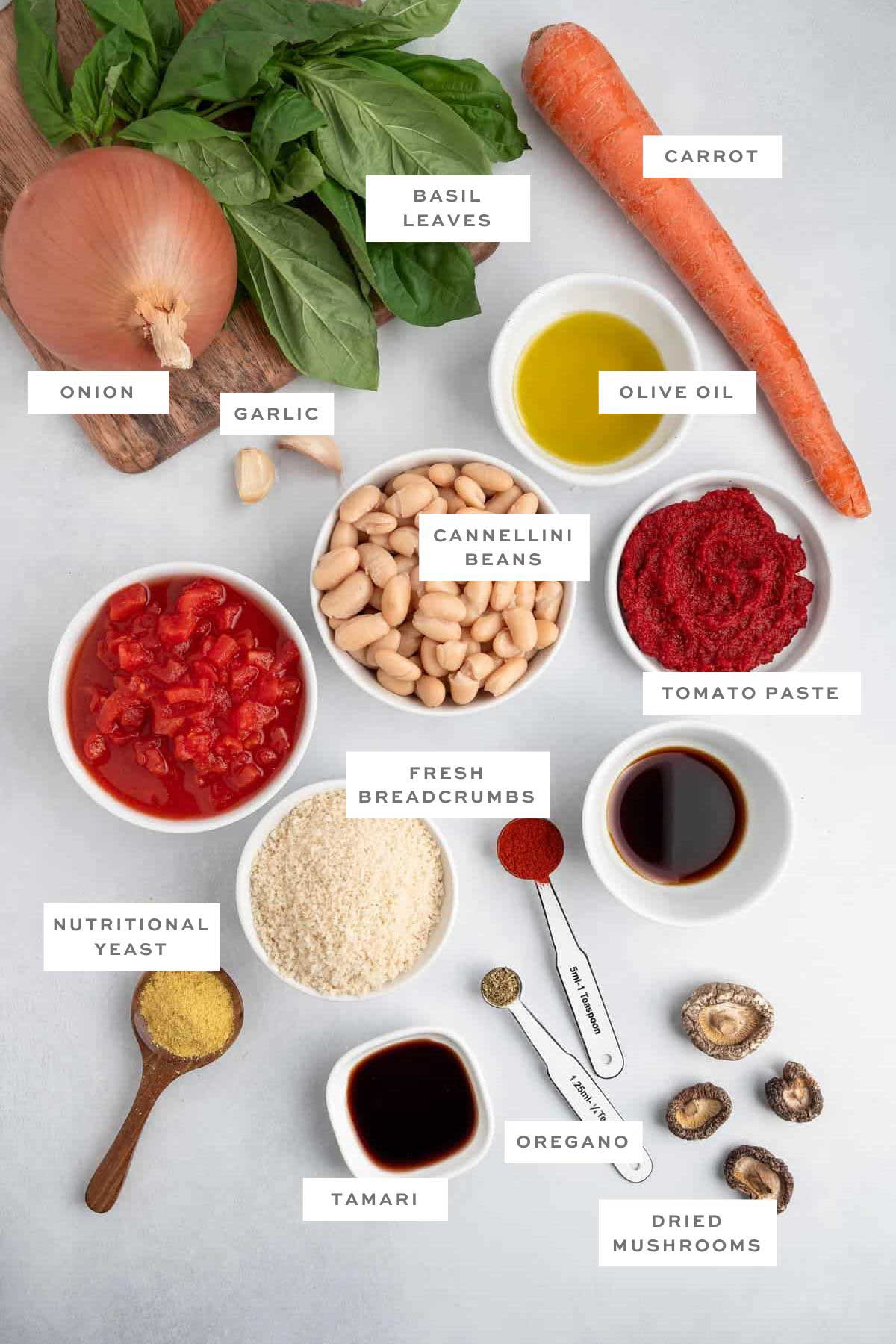 Key ingredients for vegan meatballs with labels.