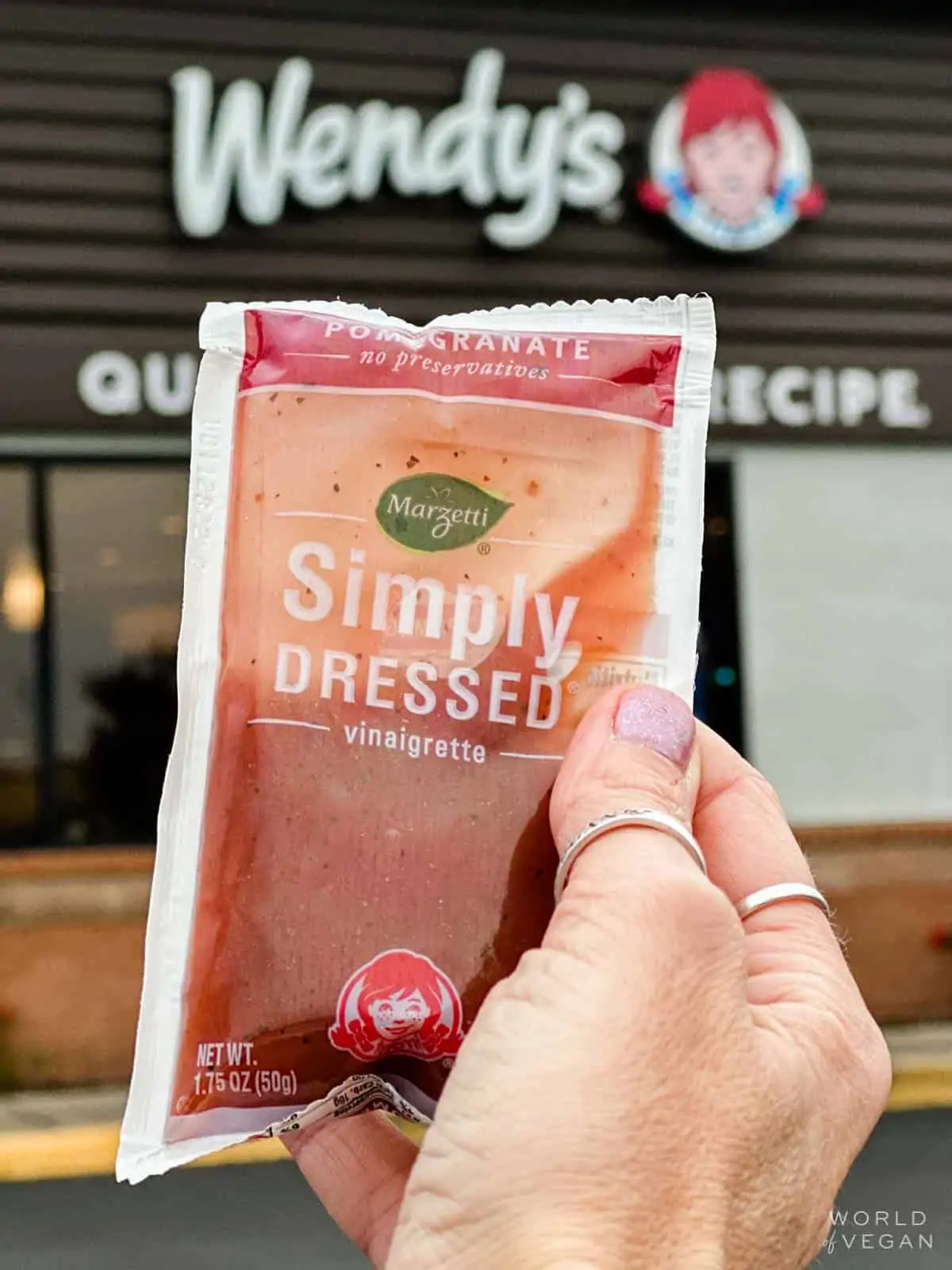 Accidentally vegan pomegranate vinaigrette salad dressing packet from Wendys. 