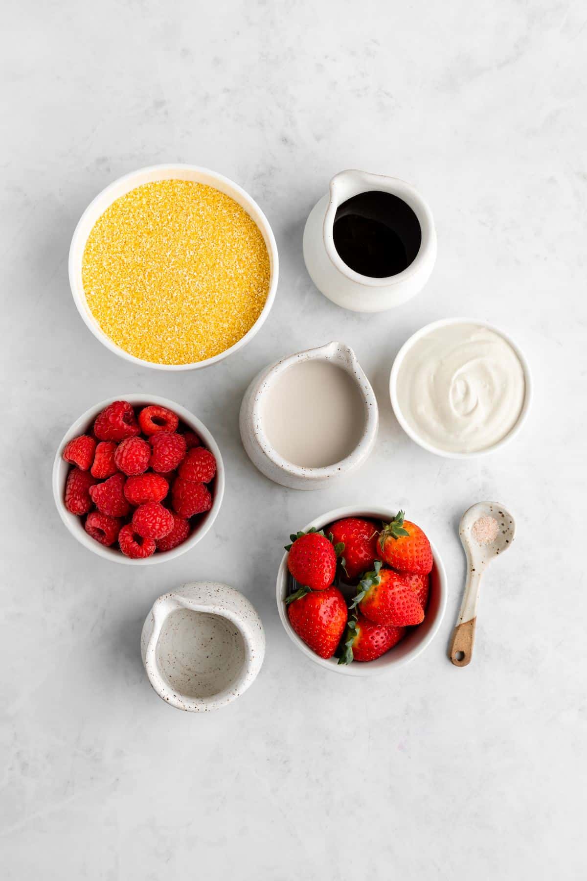 Ingredients for creamy vegan grits measured out in individual bowls.