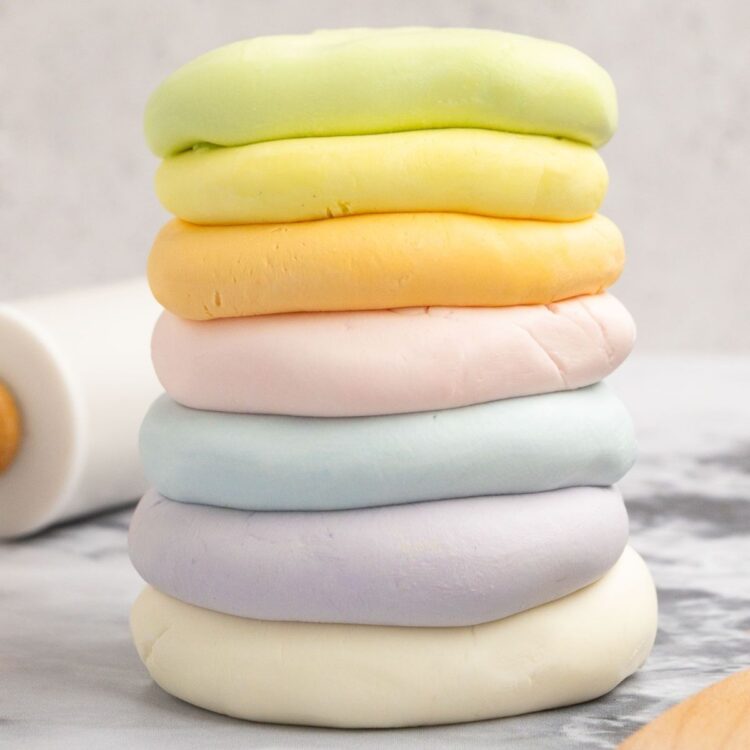 A stack of colored cloud dough spheres in a stack.