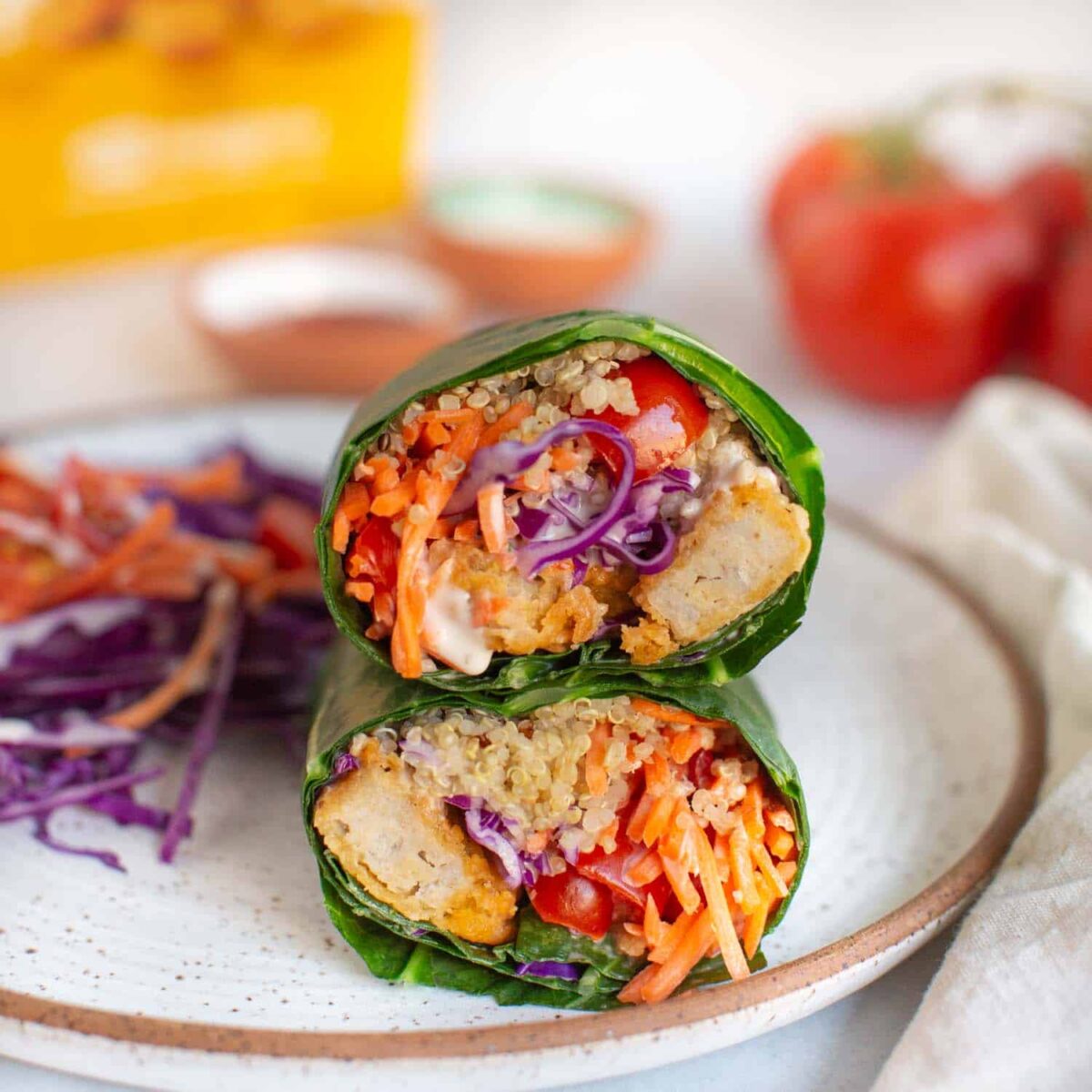 Collard green wraps with tofu and crisp vegetables, a refreshing complement to vegan picnic ideas.