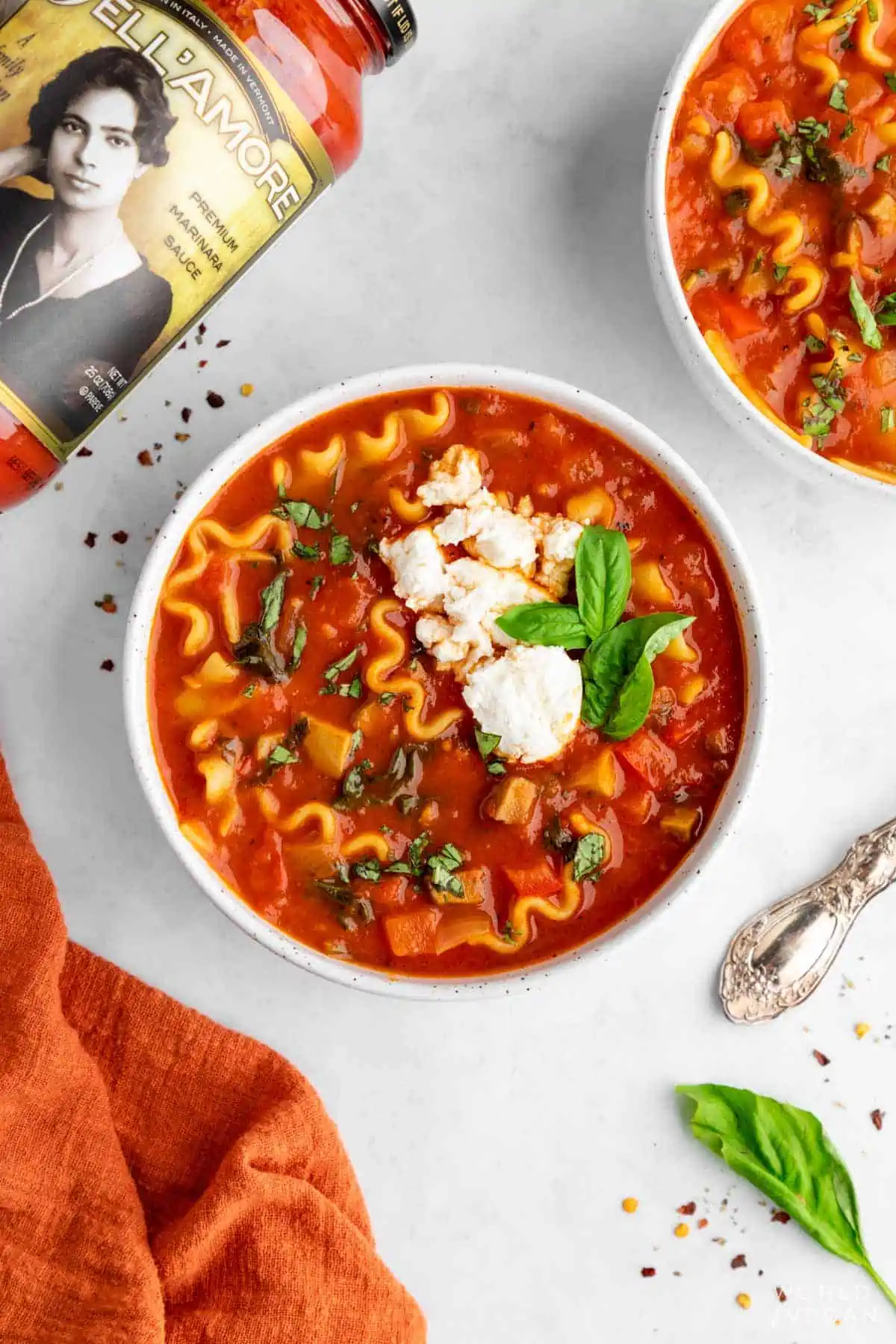 https://www.worldofvegan.com/wp-content/uploads/2022/12/vegan-lasagna-soup-dell-amore-marinara.webp