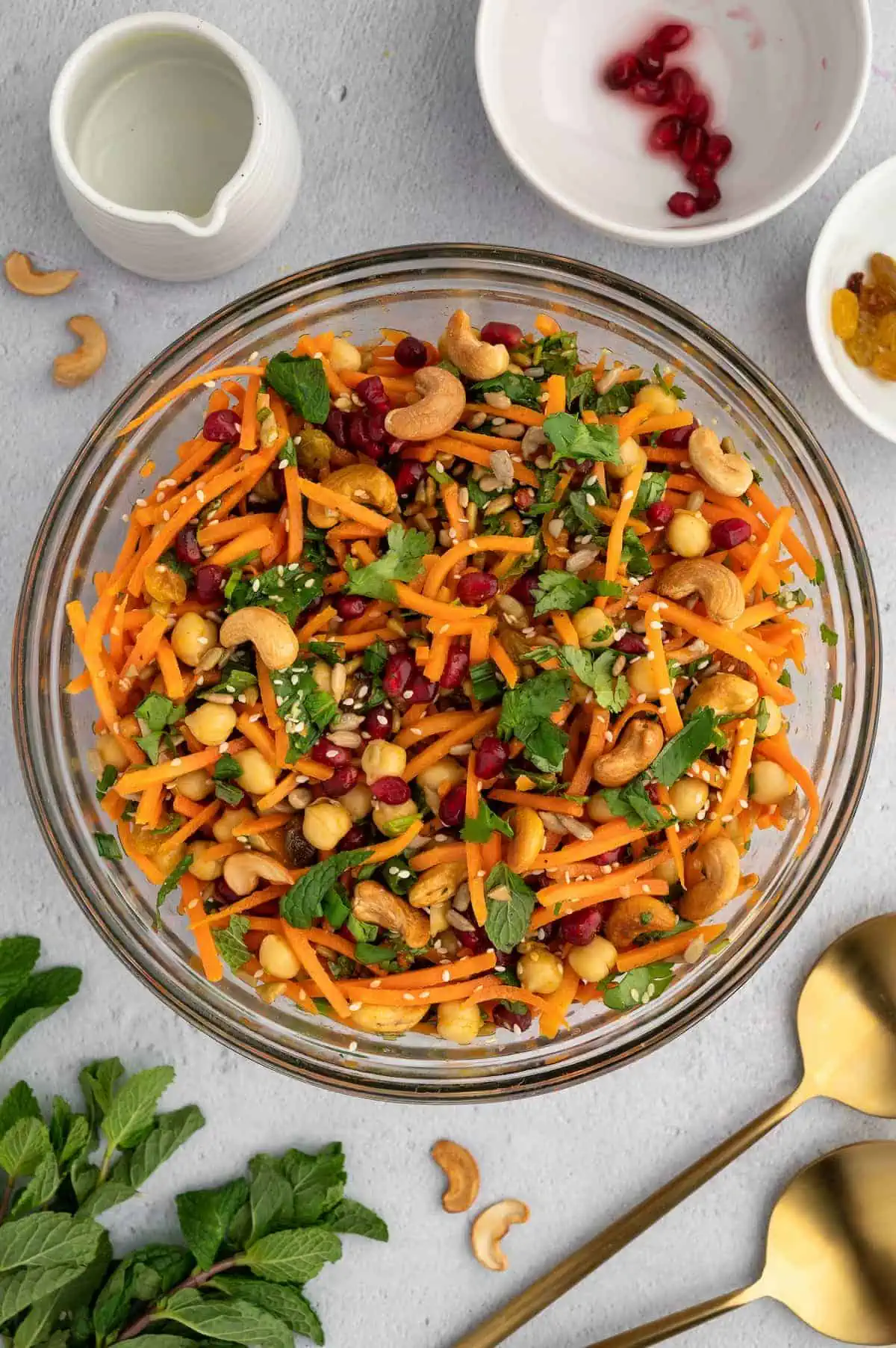 A bowl of Moroccan carrot salad prepped and tossed.