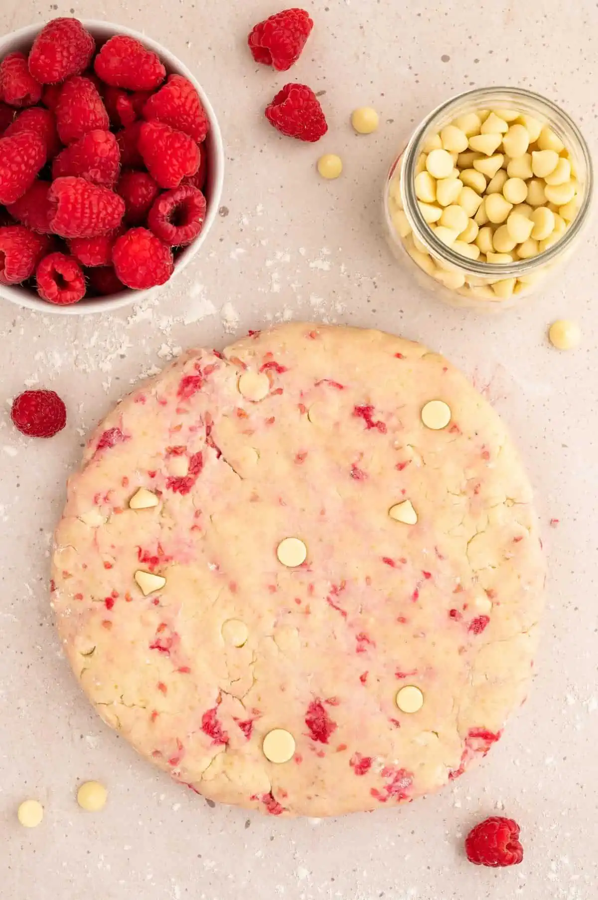 Vegan scone dough, formed into a disc.