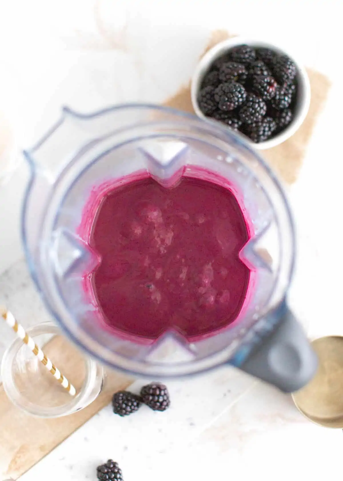 Blackberry smoothie in a blender pitcher.