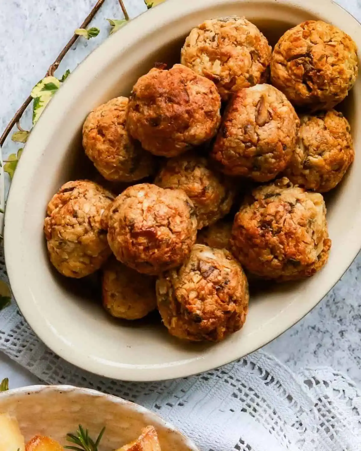 Vegan sausage stuffing balls in a serving platter.