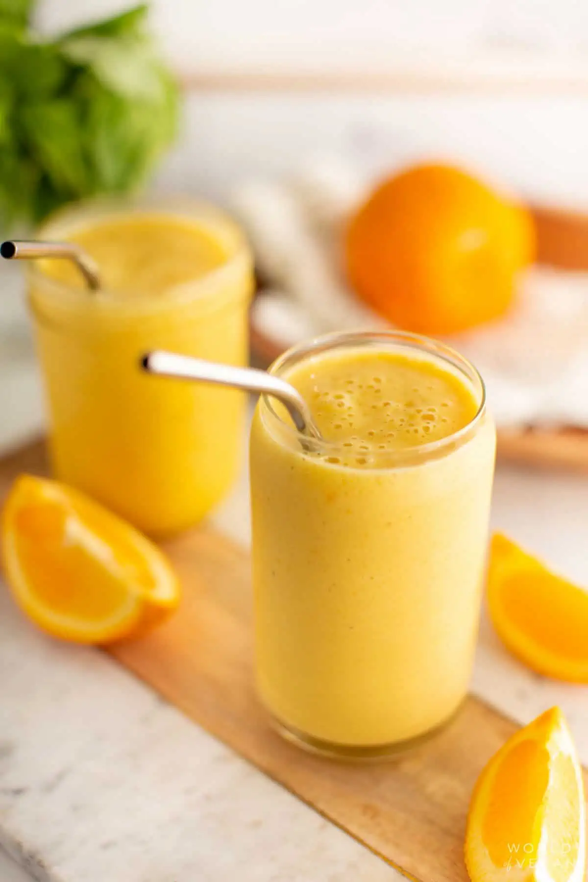 https://www.worldofvegan.com/wp-content/uploads/2023/03/Orange-juice-smoothie-angled.webp