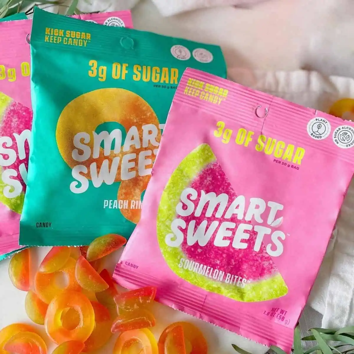 A few bags of Smart Sweets brand vegan gummies.