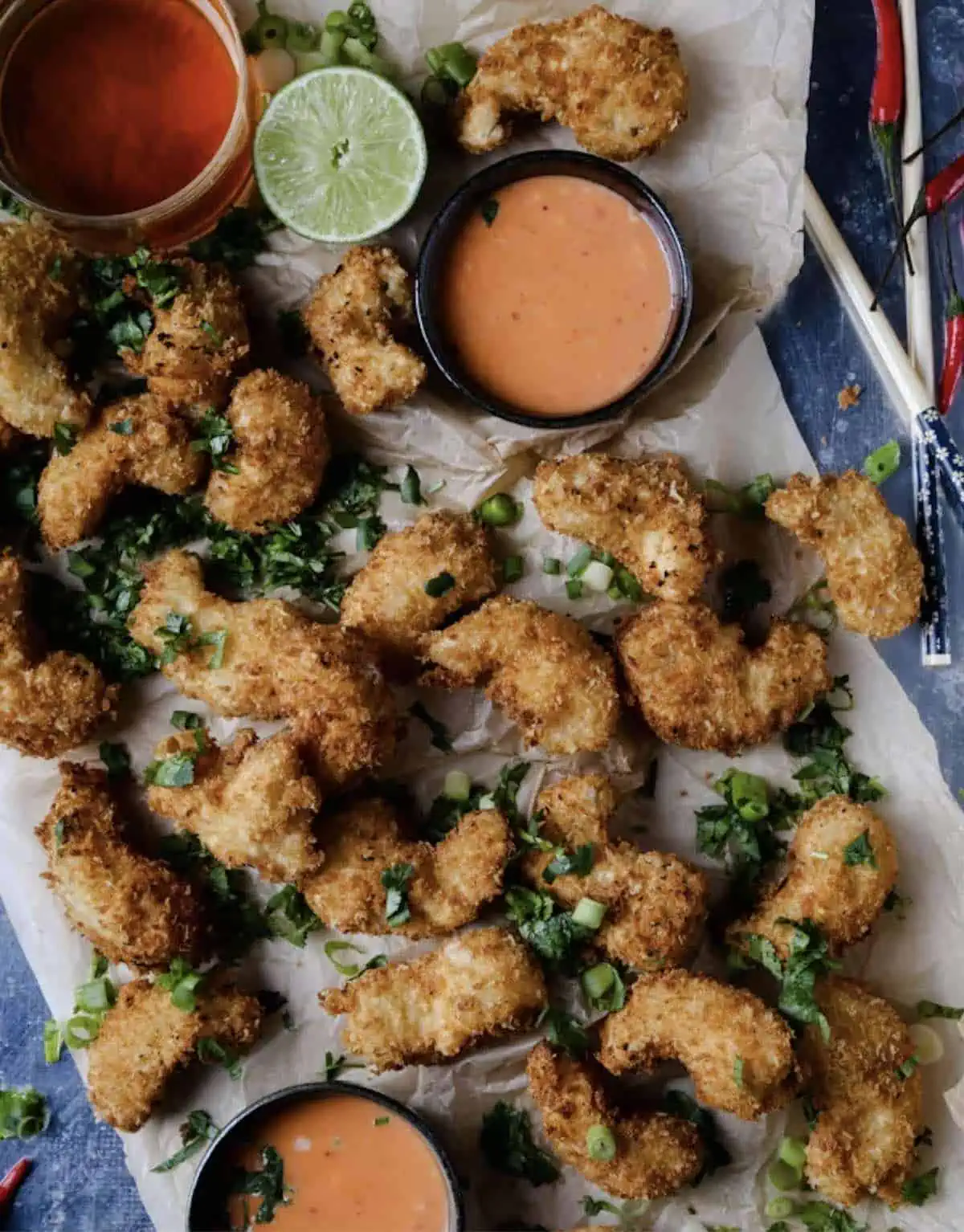 Crispy vegan shrimp on a serving platter with tartar sauces. 