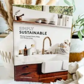 Photo of a book about how to have an eco friendly home and vegan homemade cleaning products.