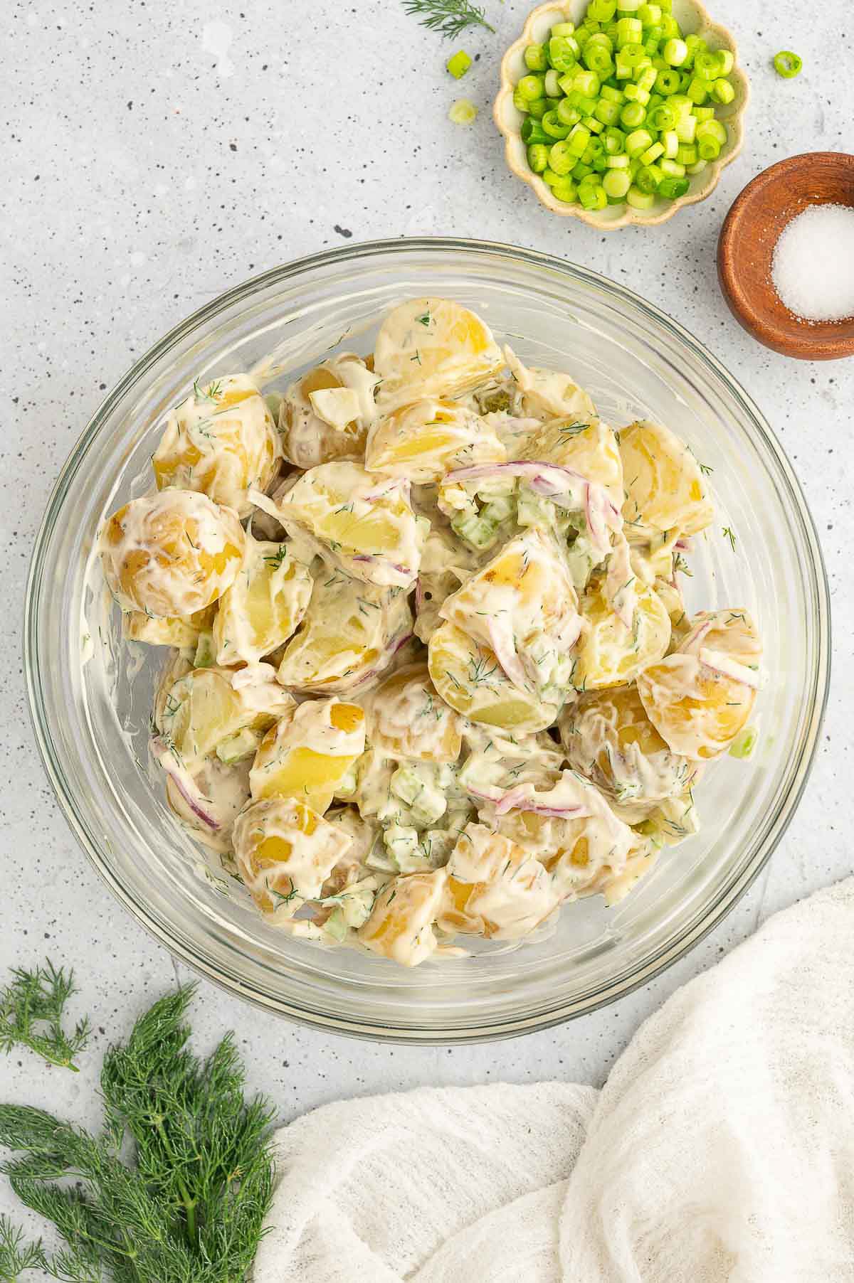 Vegan potato salad in a glass bowl.