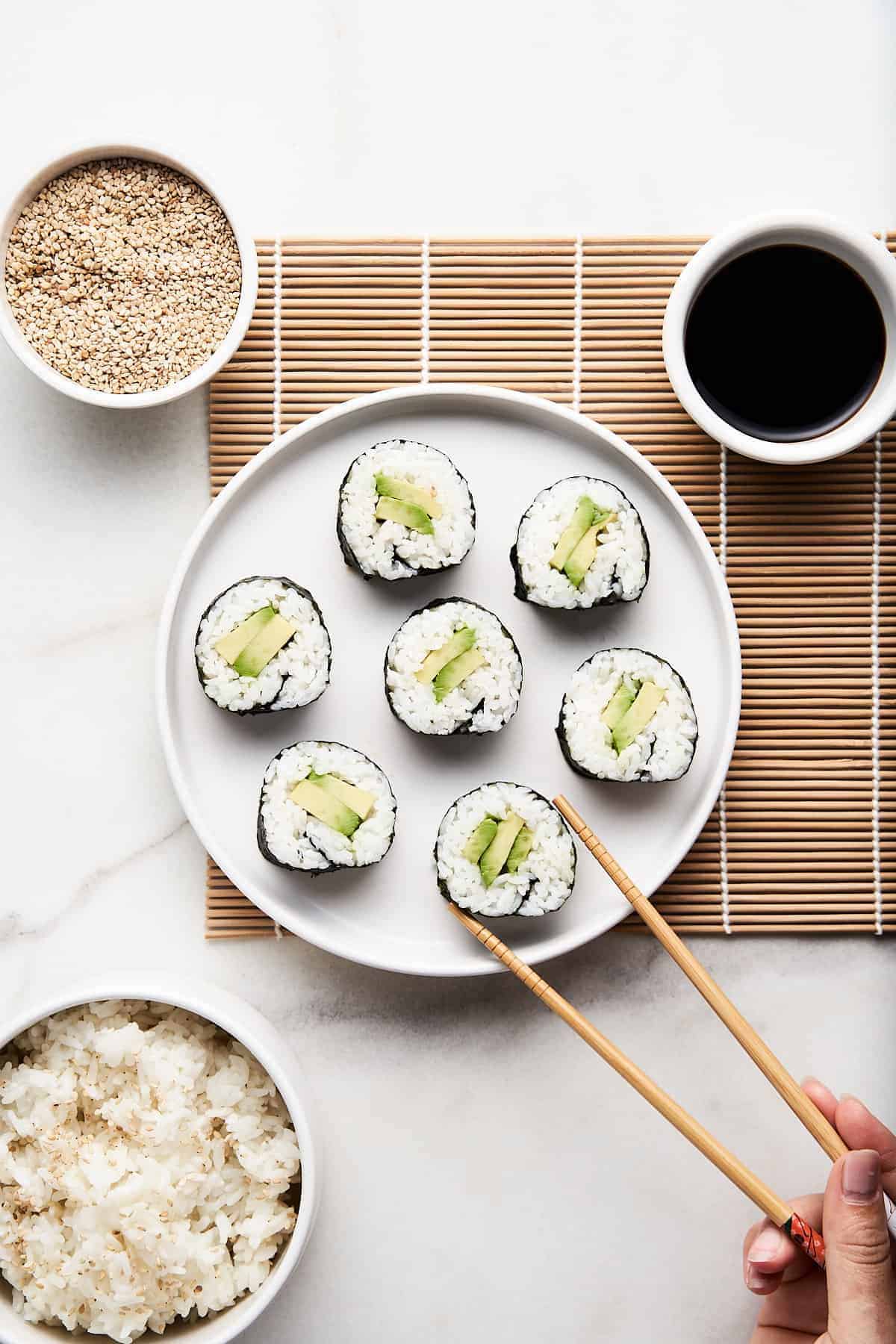 A plate of avocado maki rolls.