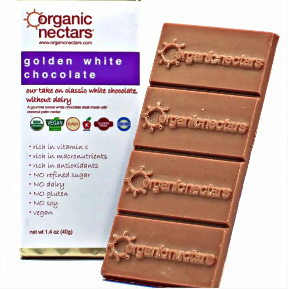 Organic Nectars vegan golden white chocolate bar next to the packaging.