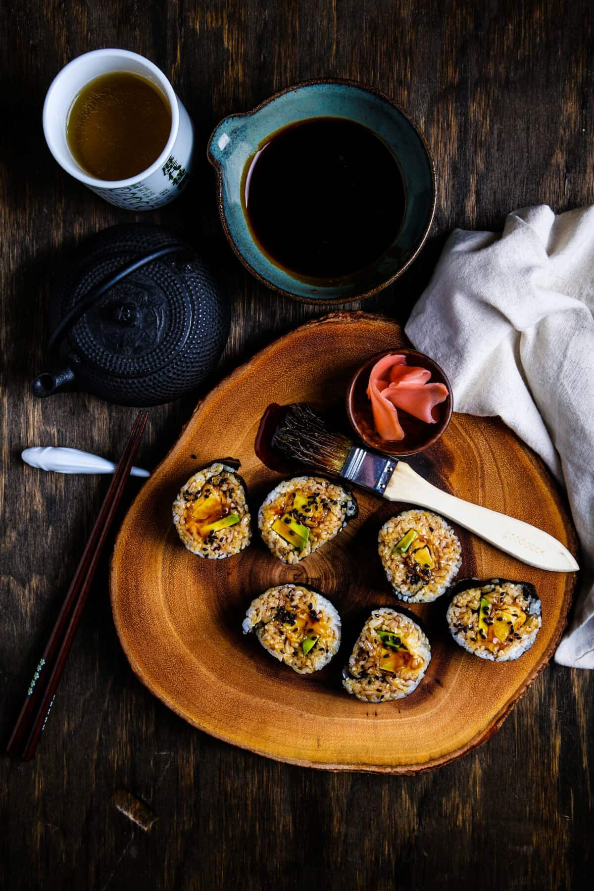 Sweet potato tempura rolls with teriyaki sauce.