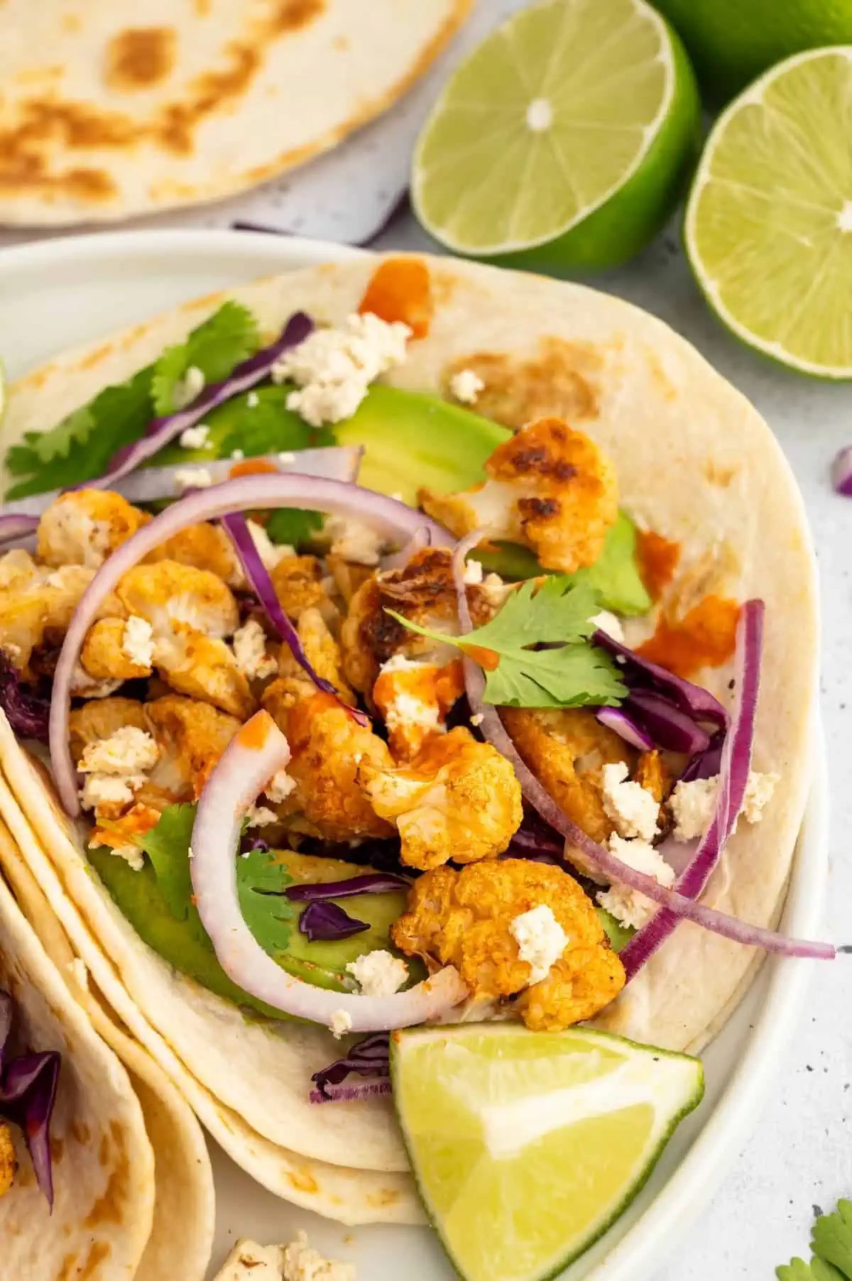 A side shot of a vegan cauliflower taco.