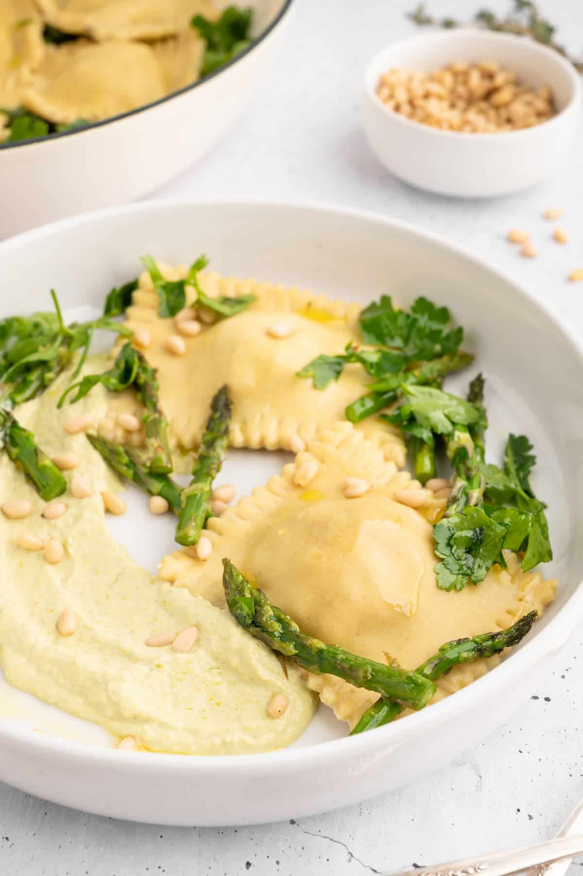 A plate of vegan mushroom ravioli.