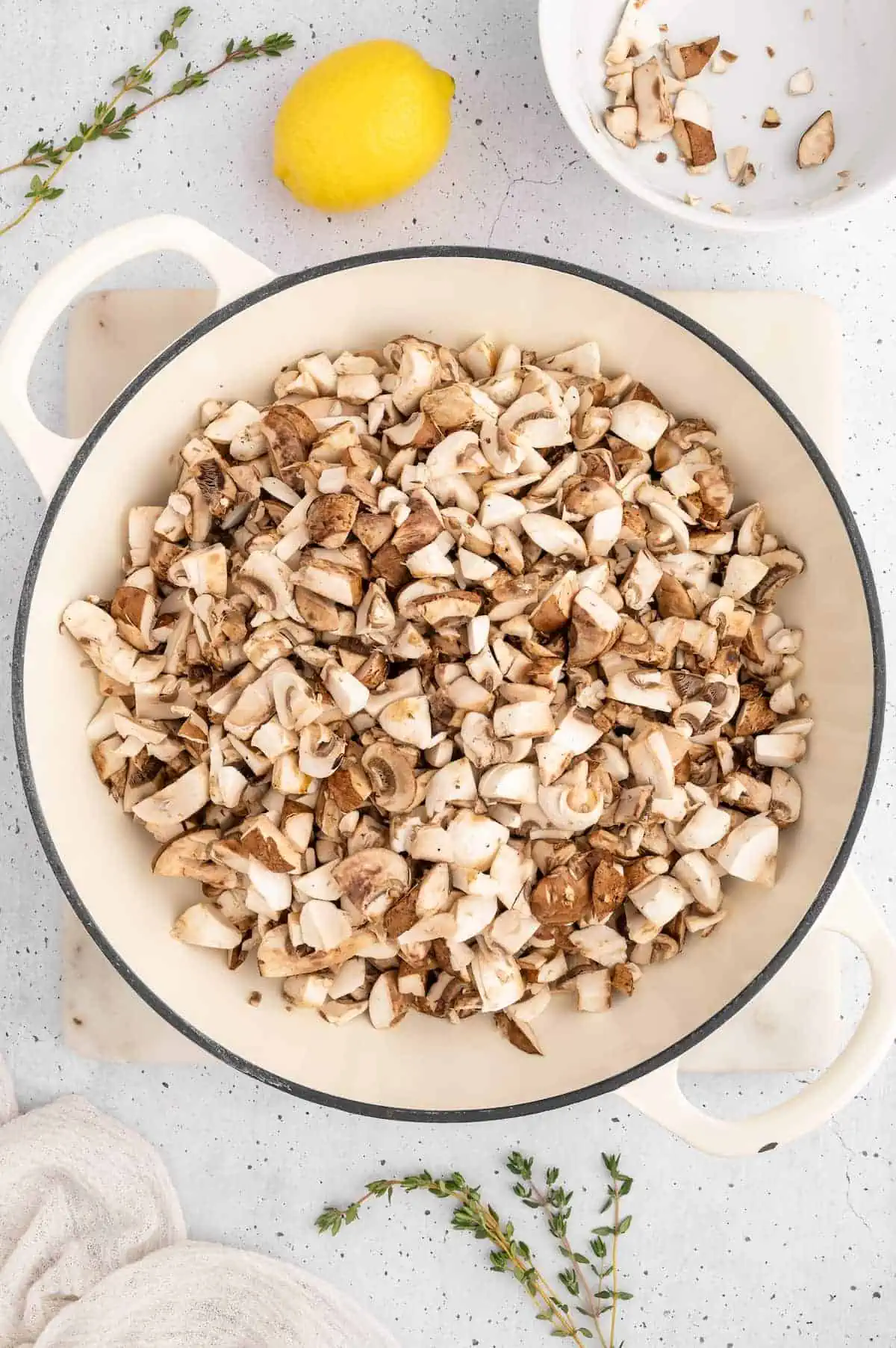 Chopped mushrooms in a pan.