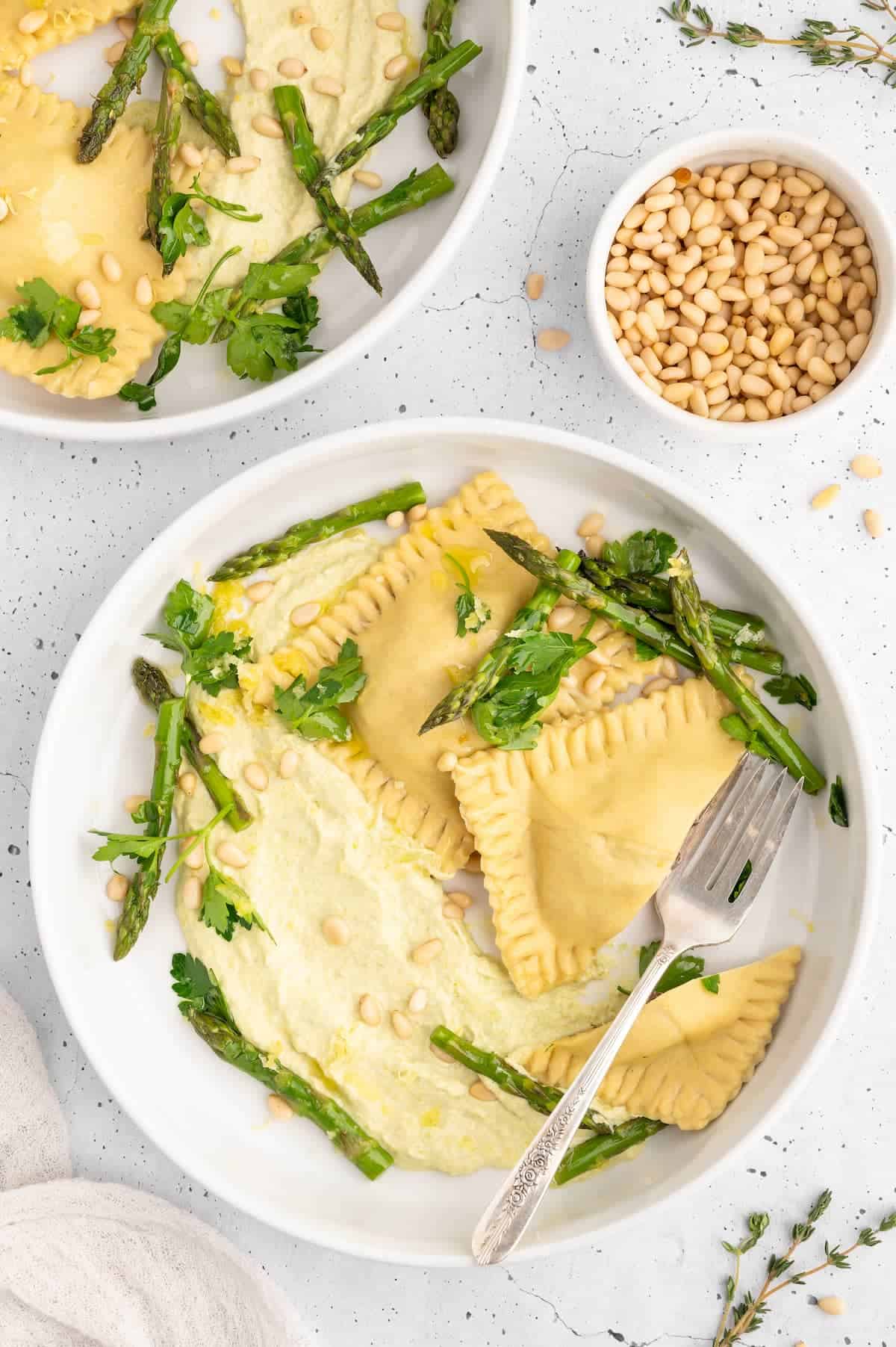 A plate of vegan mushroom ravioli.