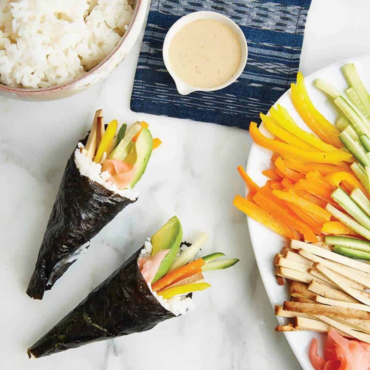 A pair of vegan sushi hand rolls.