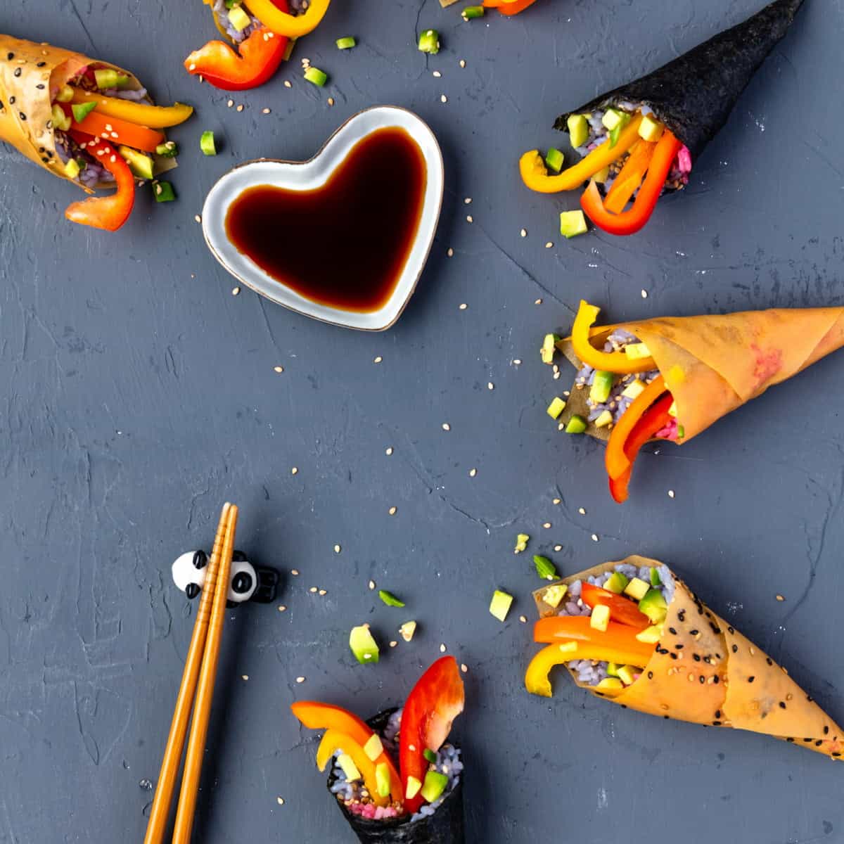 Vegan hand rolls arranged on a tabletop.