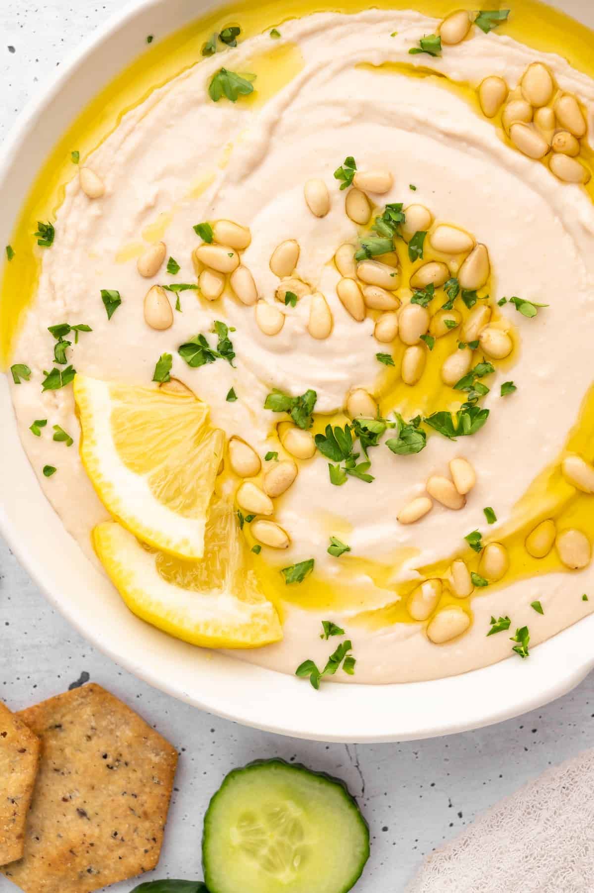 A bowl of white bean hummus, a refreshing complement to vegan picnic ideas.