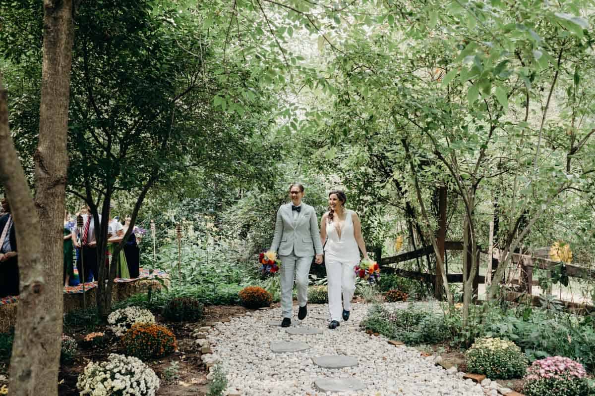 DIY backyard woodland secret garden wedding entrance.