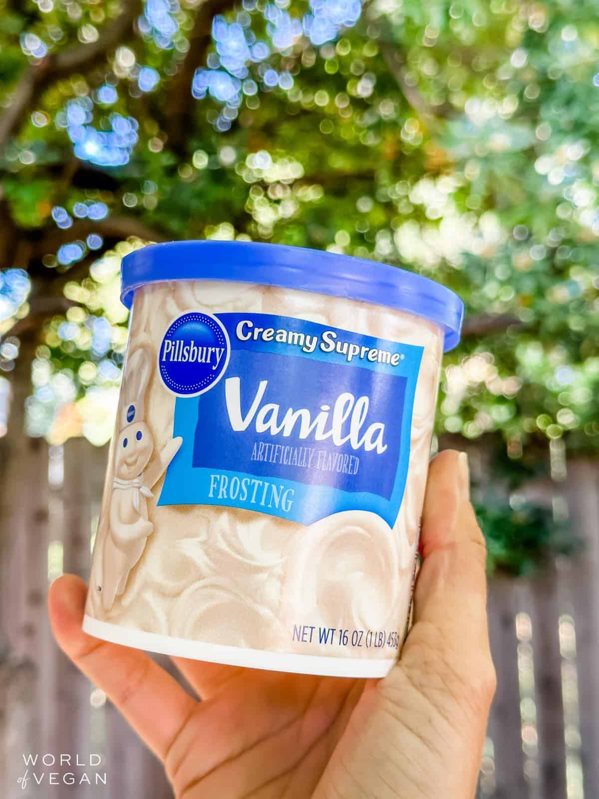 Blue container of Pillsbury vegan vanilla frosting. 