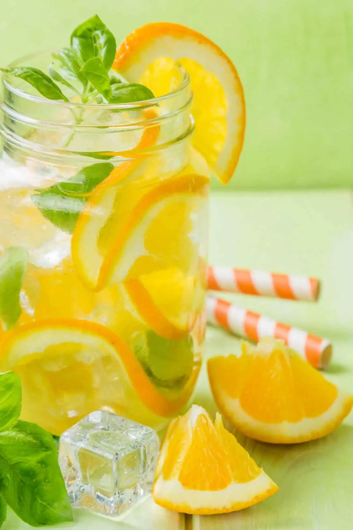 A glass of basil orange-infused water.