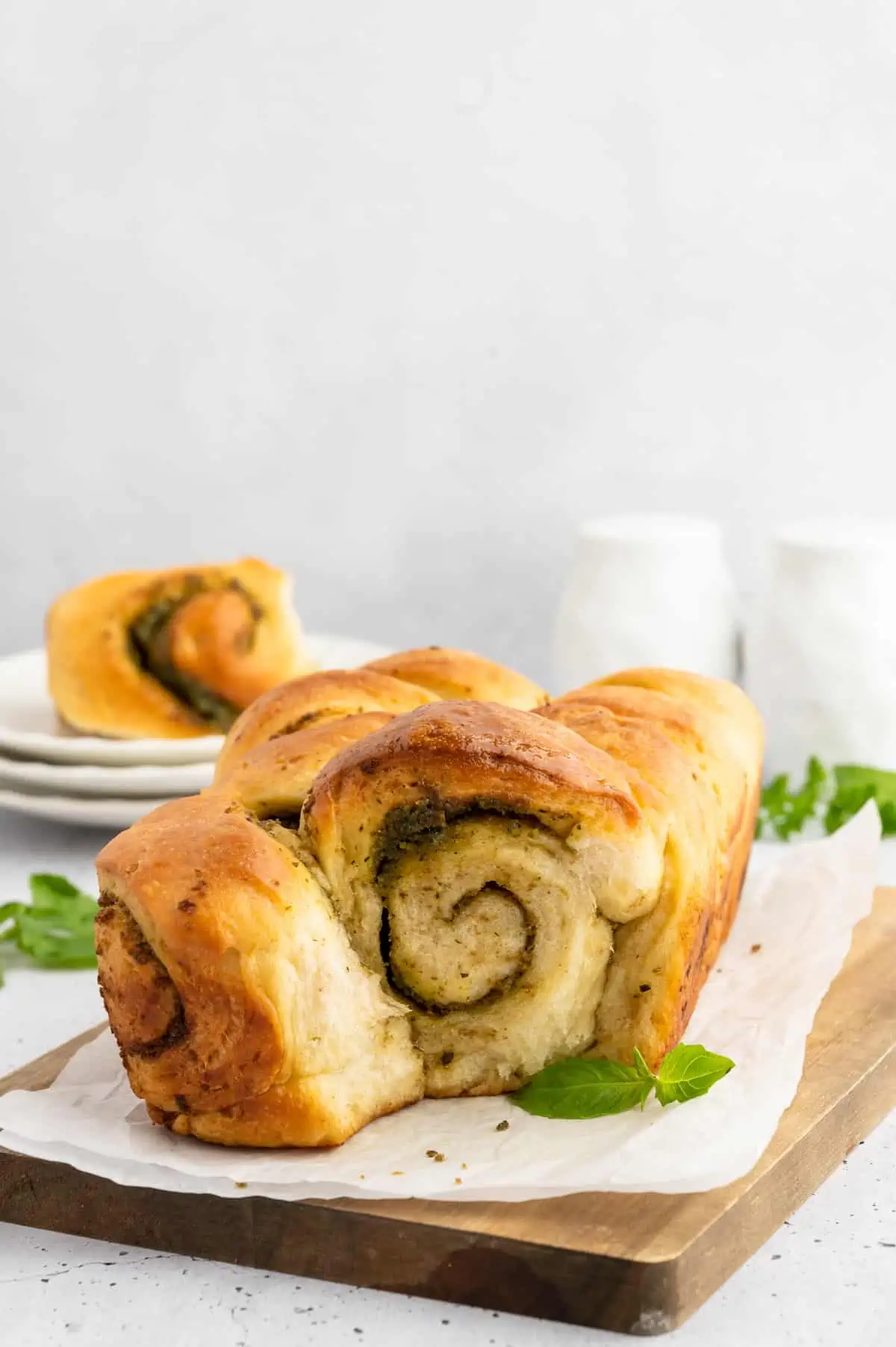 Pesto bread, baked, cut and served.