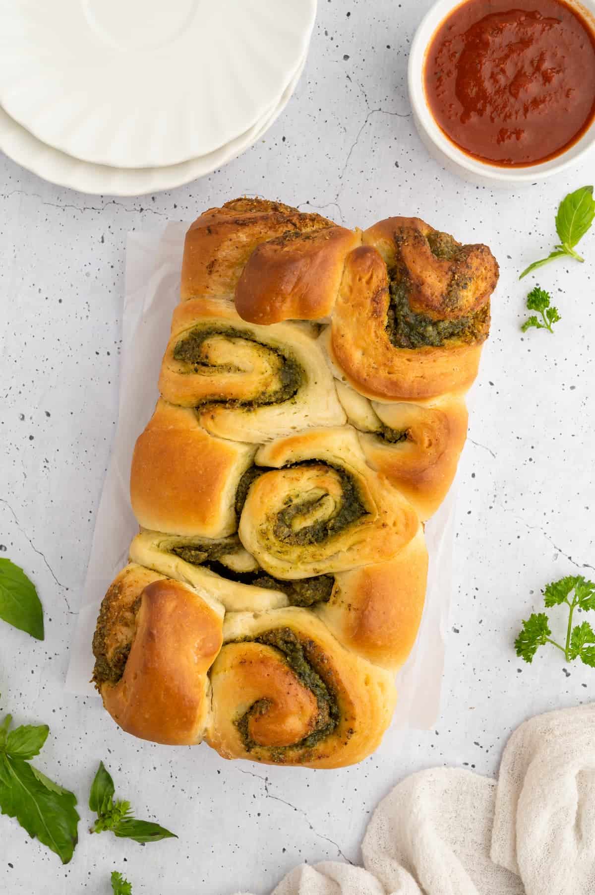 A batch of baked pesto bread.